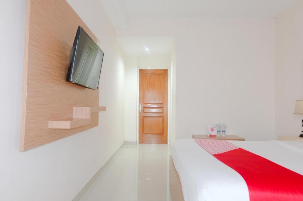 Oyo 696 Hasanah Guest House Syariah De Saphire Malang Eksteriør billede